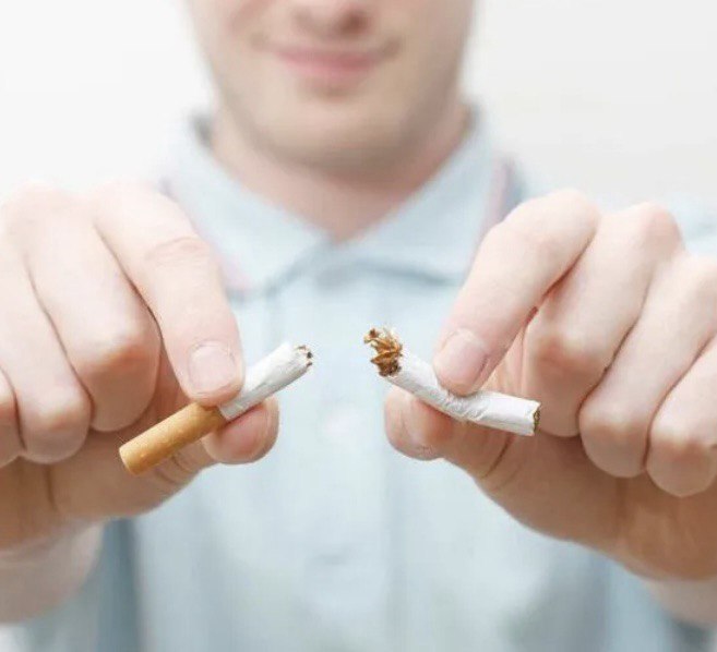 Breaking a cigarette in half to quit smoking